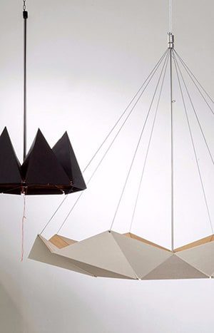 Two modern geometric pendant lights.
