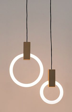 Two modern ring pendant lights hanging.