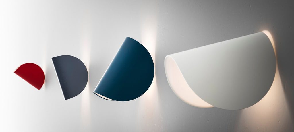 Four modern wall lamps in red, blue, and white.