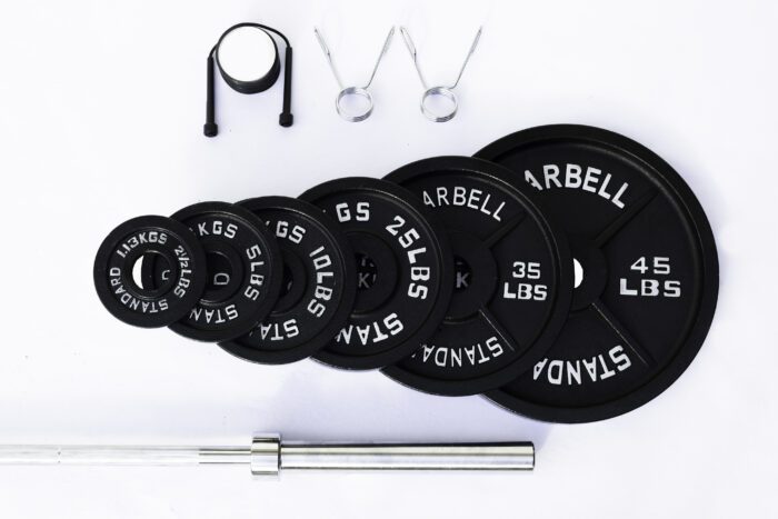 Weightlifting equipment with barbell and plates.