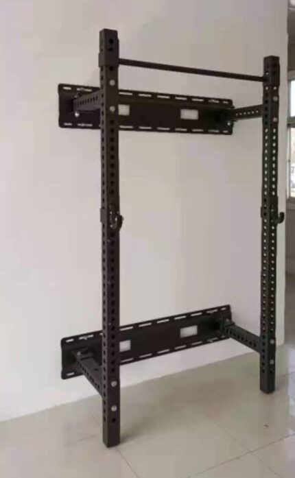 Wall-mounted black metal weight rack.