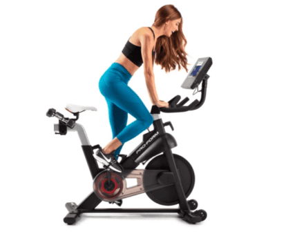 Woman exercising on a ProForm stationary bike.