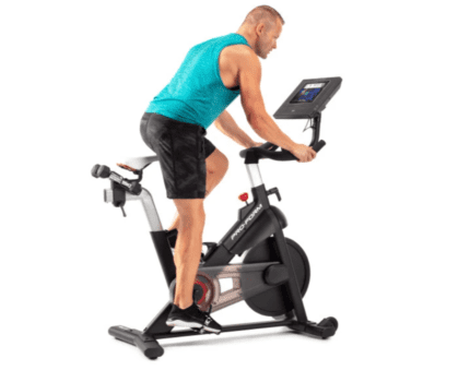 Man working out on a stationary bike.