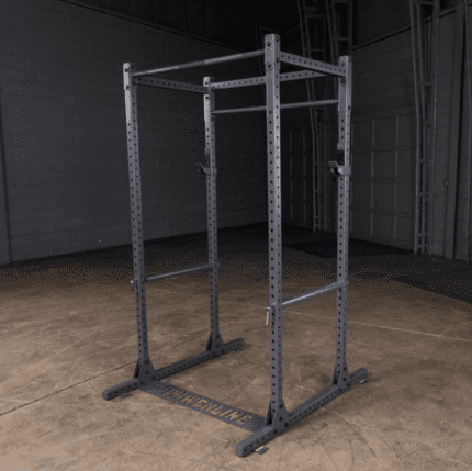 Gray metal weightlifting rack on concrete.