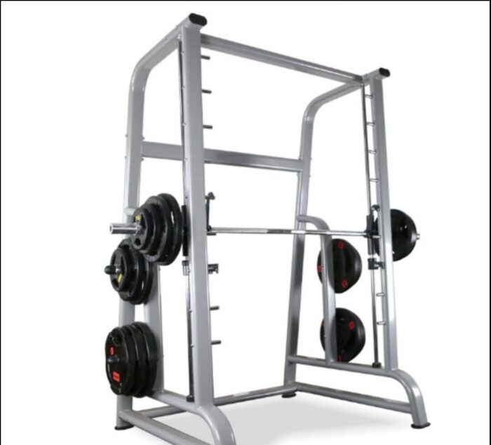 Smith machine with weight plates.