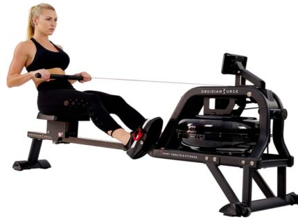 Woman rowing on a black Obsidian Surge rower.