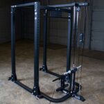Black power rack with pulley system.