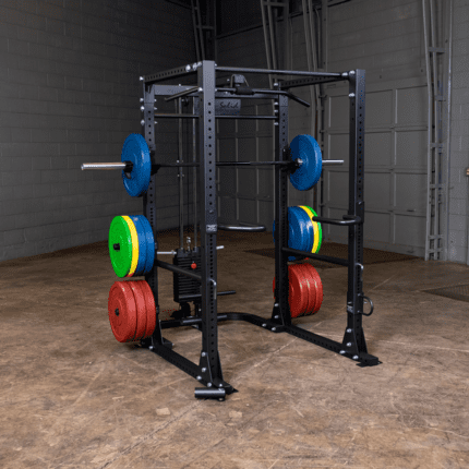 Black power rack with weight plates.