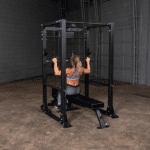 Woman doing lat pulldown exercise on a machine.