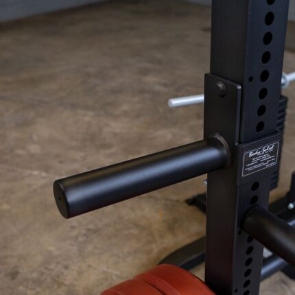 Black weight rack with safety bars.