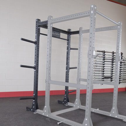 Grey and black power rack with j-cups.