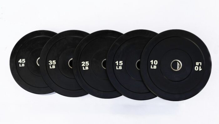 Six black weight plates in pounds.