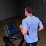 Man running on an endurance treadmill.