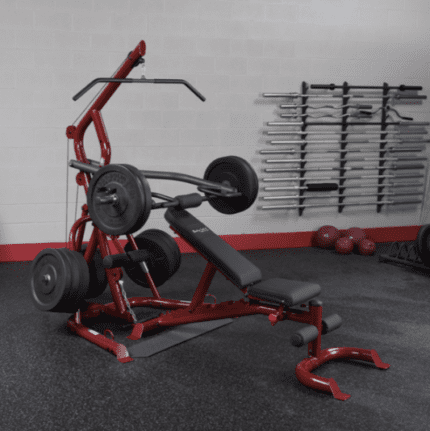 Red home gym weight machine with bench.