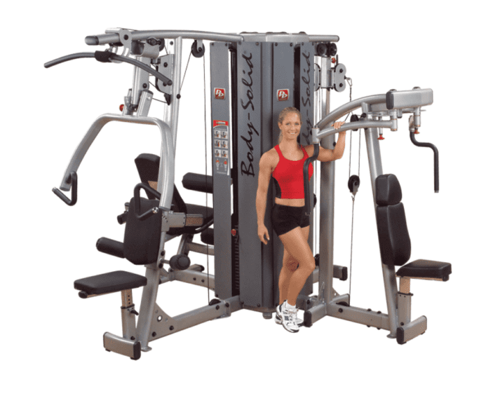 Woman using Body-Solid home gym equipment.