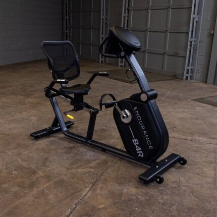 Black recumbent exercise bike with wheels.