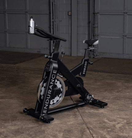 Black spin bike with Endurance logo.