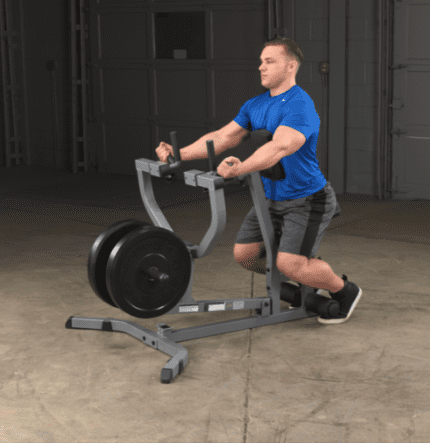 Man working out on a row machine.