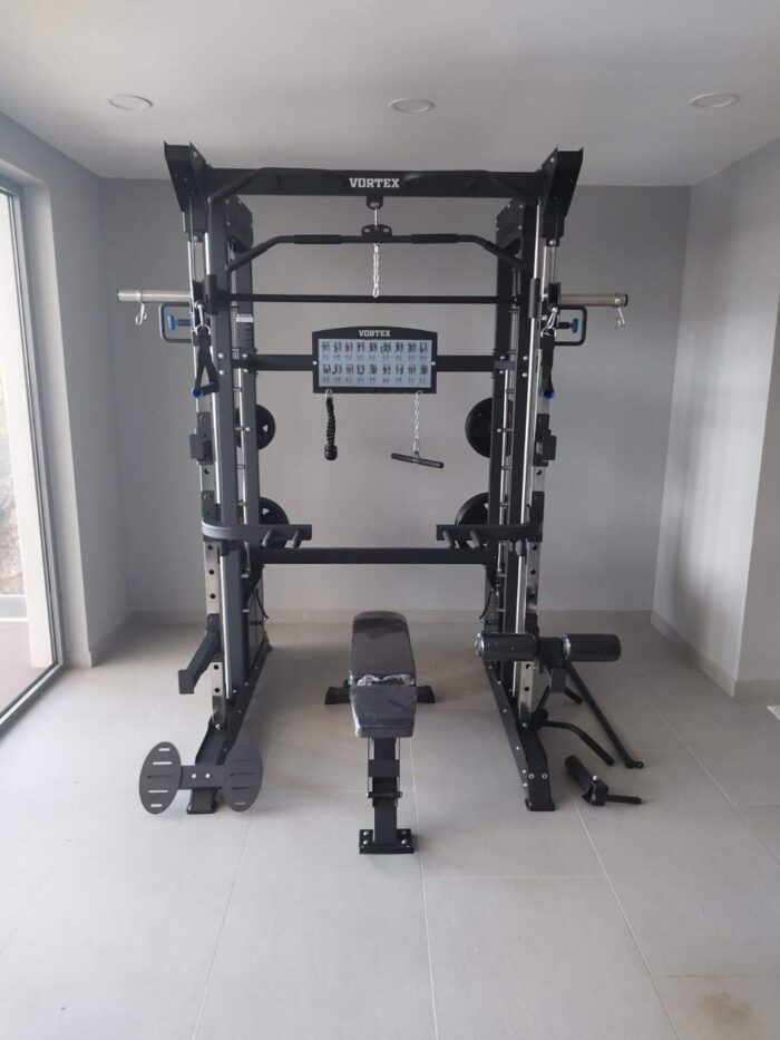 Black Vortex weightlifting cage with bench.