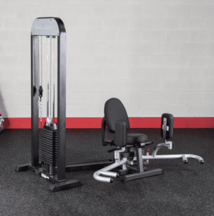 Black seated hip abduction machine.