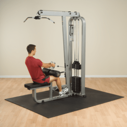 Man using a lat pulldown machine.