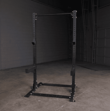 Black metal power rack with pull-up bar.