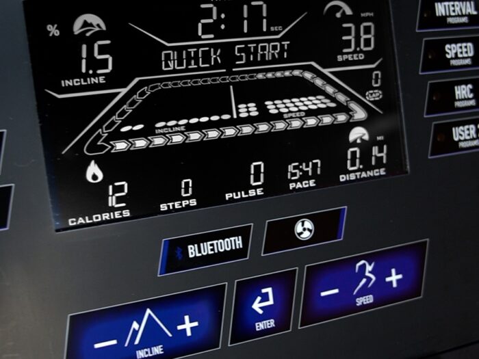 Treadmill console with workout stats.