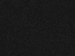 Black textured background with small particles.