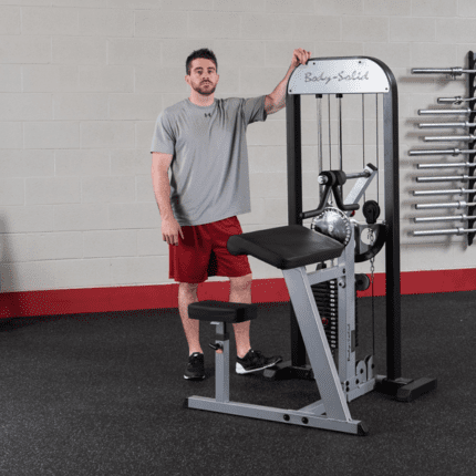 Man using a Baby-Solid lat pulldown machine.