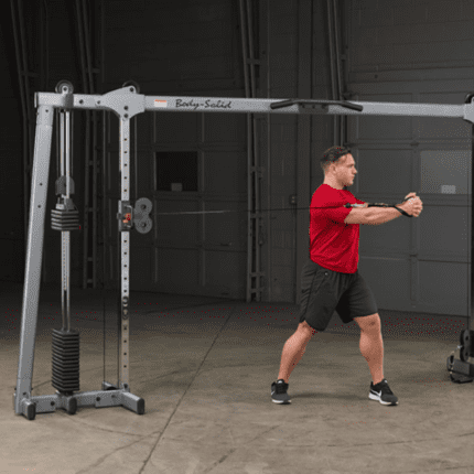 Man using cable machine for workout.