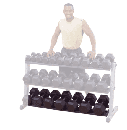 Man standing by dumbbell rack.