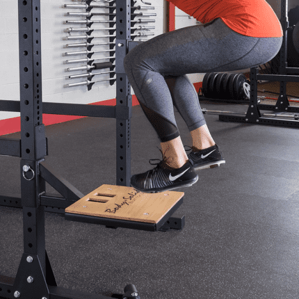 Woman doing a box jump workout.