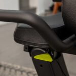 Exercise bike seat and adjustment lever.