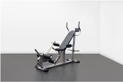 Weight bench in empty workout room.