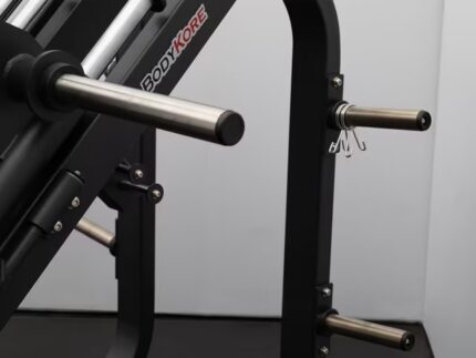 Weightlifting machine with metal bars and hooks.