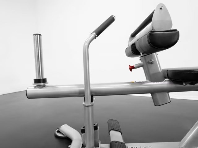 Exercise equipment in a gym setting. Exercise equipment in a gym setting.