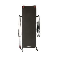 Black fitness mat with resistance bands attached.
