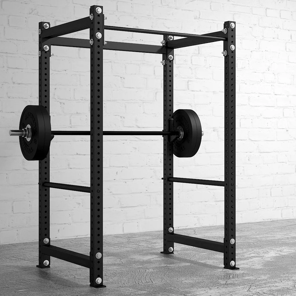 Power rack with barbell and weights. Power rack with barbell and weights.