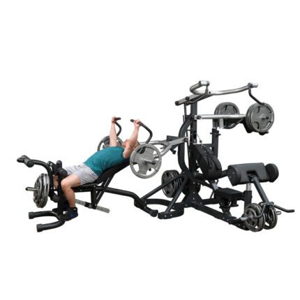 Man using a multi-station exercise machine.
