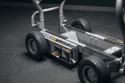 Heavy-duty utility cart with large wheels.