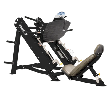 Leg press machine on a black background.