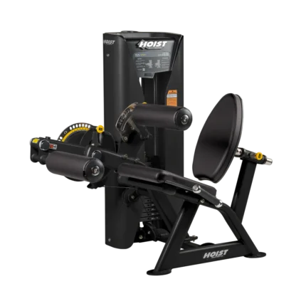 Leg curl machine on black background.