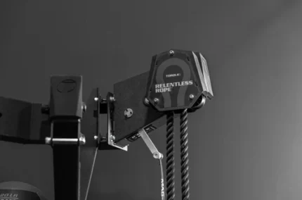 Gym equipment with rope pulley system.