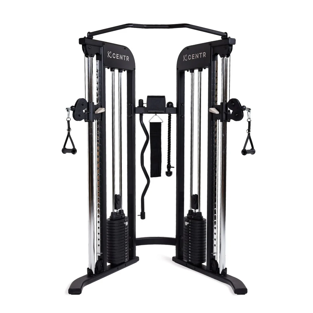 Dual cable crossover gym machine with attachments. Dual cable crossover gym machine with attachments.
