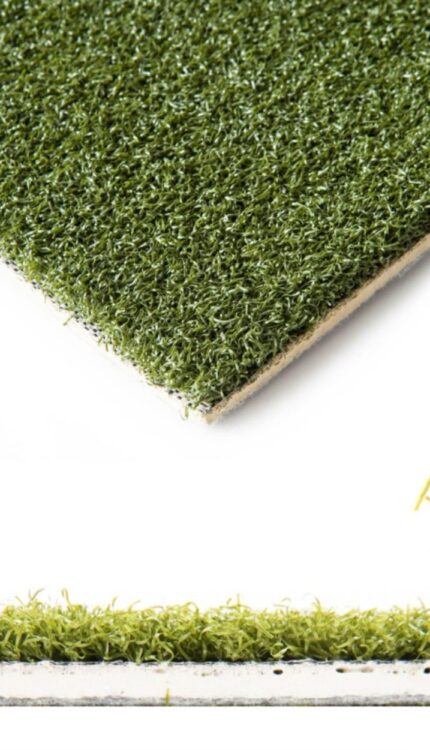 Artificial grass sample on white background.