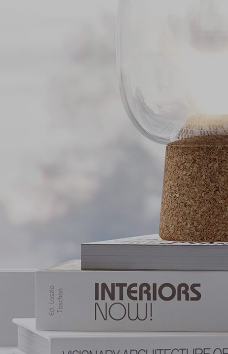 Glass vase on a book, "Interiors Now!"