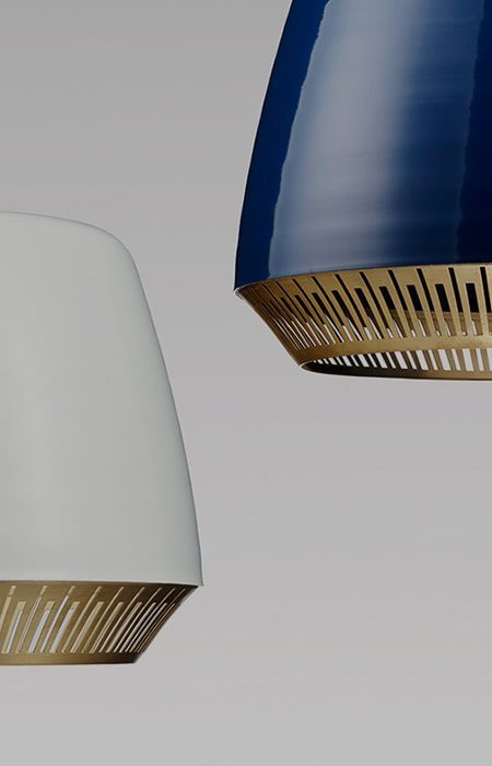 Two modern pendant lights with gold trim.